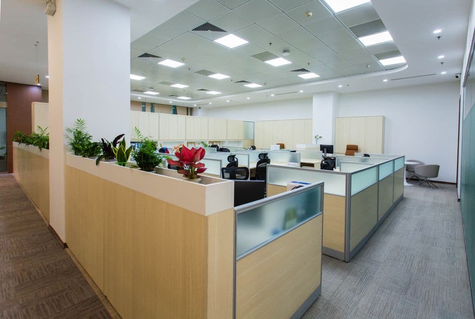 Commercial office building interior with modern workspace design.