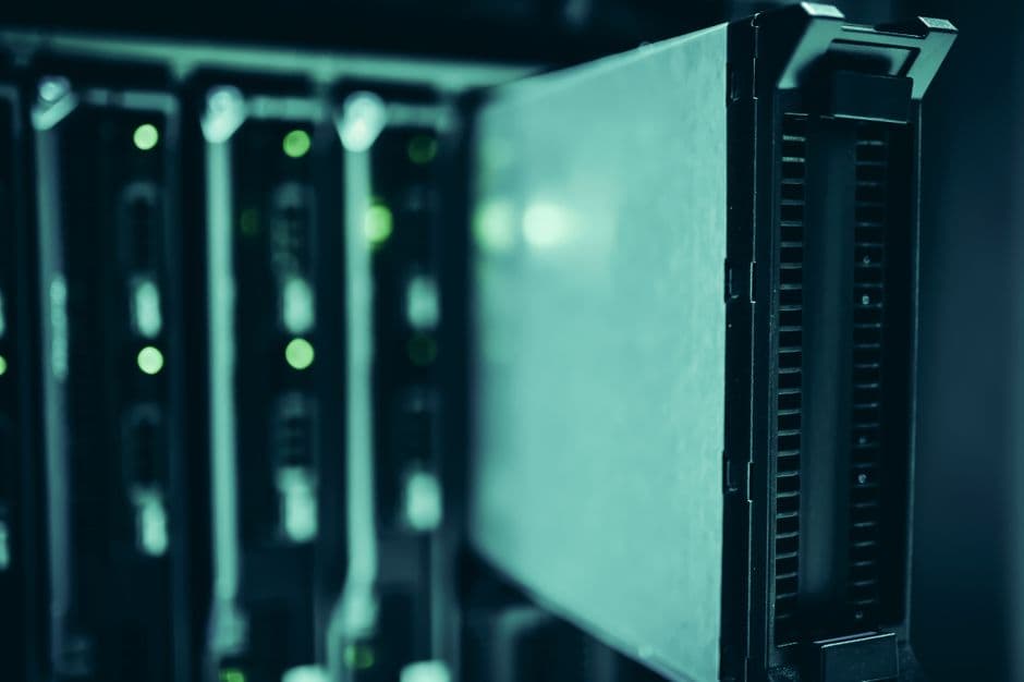 Server room in data center with technology equipment racks.